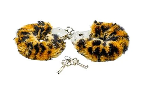 Soft cuffs with color under leopard for sexual games, isolated on a white b.. Stock Photos