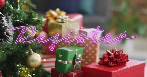 Soft cursive script appearing tracing into pink neon Register over gifts near Stock Footage 321889715