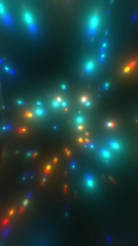 Soft cyan, red, yellow, and blue lights form a colorful bokeh pattern acros.. Stock Footage 345424327