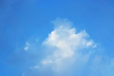 Soft dark and Light Thunder clouds in a beautiful blue sky Foto stock