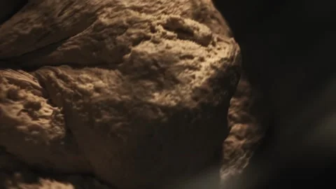 Soft dough whipped by rotating spiral of industrial mixer. Texture. Baking Stock Footage 341656735