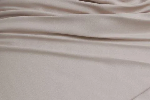 Soft, draped, light beige fabric texture Stock Illustration