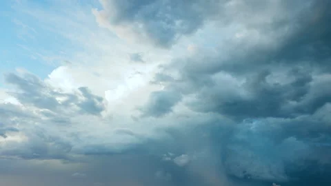 Soft drifting clouds seamless looping animated background Stock Footage 345616260