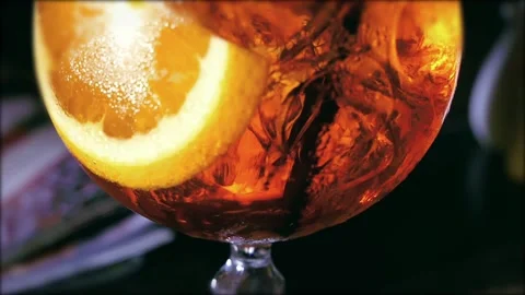 Soft drink with slice of orange. Stock Footage 122398930