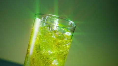 Soft drink Splashing in Ice Star Filter Stock Footage 63722766