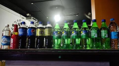 Soft drinks arranged on a table top Stock-Fotos
