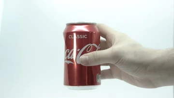 Soft drinks can being held, removed and shown Stock Footage 85853332