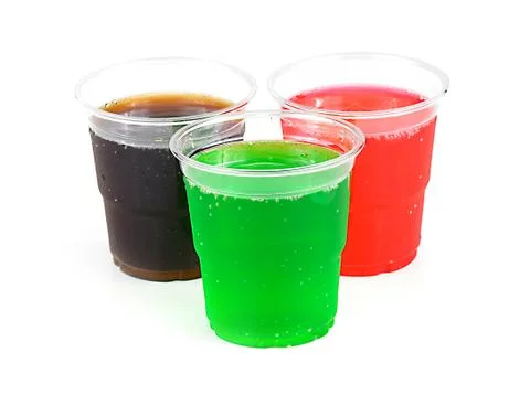 Soft drinks in plastic cups on white Stock Photos