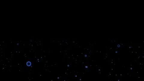 Soft drops of particles falling smoothly down, creating an atmosphere of ra.. Stock Footage 309513464