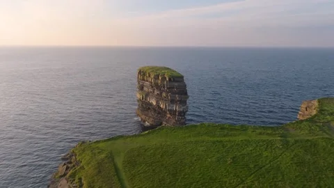 Soft Evening Flyby of Dun Briste Sea Stack and Nearby Clifftop. Ireland R Stock Footage 342055698