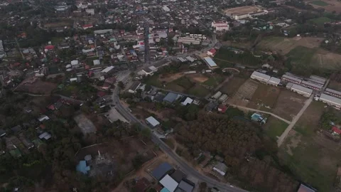 Soft evening glow over Pai village, aerial shot Stock Footage 302280509