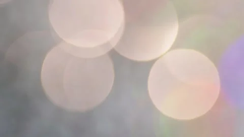Soft flickering cream bokeh circles on a light abstract background for eleg.. Stock Footage 341324885