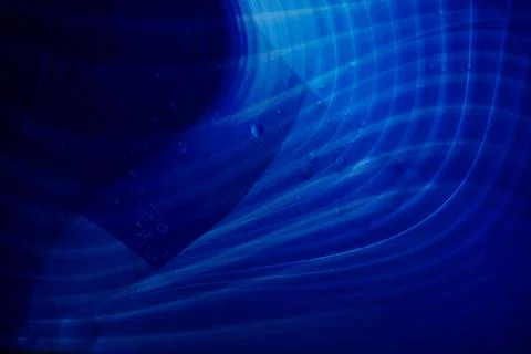 Soft flowing blue lines creating a dynamic abstract texture Stock Photos