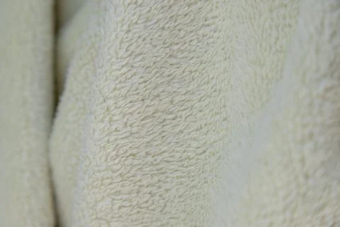 Soft, fluffy fabric texture in a light yellow tone Stock-Fotos