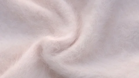 Soft fluffy jersey rotates. Soft Wool background. Video stock 118859130