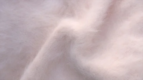 Soft fluffy jersey rotates. Soft Wool background. Video stock 119085629