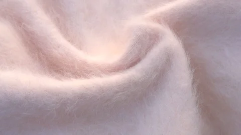 Soft fluffy jersey rotates. Soft Wool background. Stockbeeldmateriaal 121198297