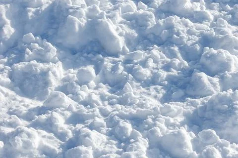 Soft, fluffy snow forms a textured, white landscape 스톡 사진