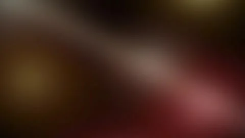 Soft focus abstract background with warm brown and deep red glowing light s.. 動画素材 336365207