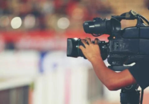 Soft focus and blurry of Professional cameraman and Video camera operator wor Stock Photos
