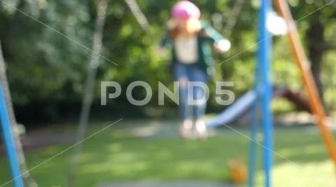 Soft Focus anonymous female On Swing Stock Photos