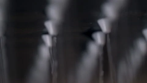 Soft focus background of running water from row of nozzles Stock Footage 162477627