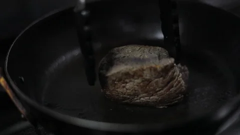 Soft Focus of Beautiful Filet Mignon on the Grill Stock Footage 129340723