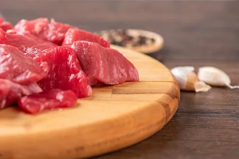 Soft focus on beef or lamb meat on a cutting board. Stock Photos