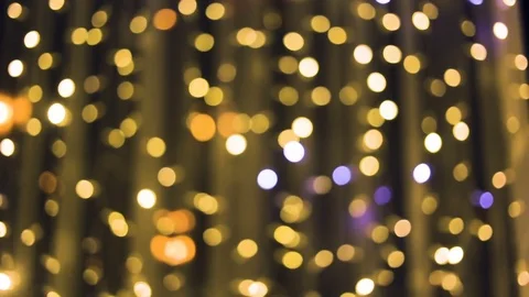 Soft focus, bokeh. Hard image without contrast. The yellow bulbs glow purple shi Stock Footage 83249193