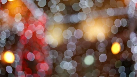 Soft focus, bokeh. The reflection in the water of festive illuminations. Colored Stock Footage 83249598