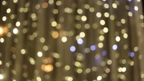 Soft focus, bokeh. Soft image, without contrast. The yellow bulbs glow purple sh Stock Footage 83249195