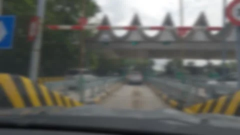 Soft focus of a car moving through an automatic Video stock 313548175