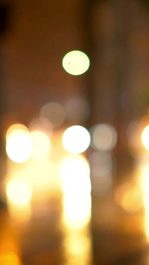 Soft focus city traffic lights creating glowing bokeh night Video stock 331928423