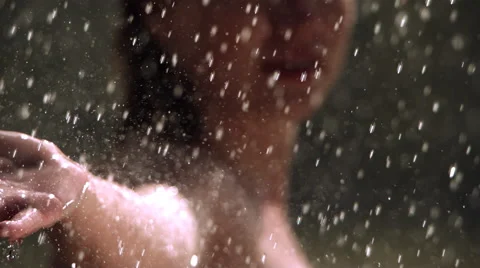 Soft focus close-up of woman's face and outstretched arm in ultra-slow motion Stock Footage 59527141