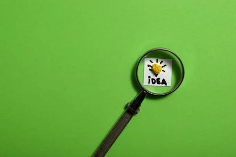 Soft focus, Creative idea concept, magnifying glass and light bulb icon Stock Photos