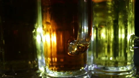 Soft focus, dark and light beer in close-up glasses, real-time, evening bar, sid Stock Footage 87426458