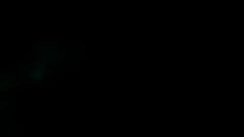 Soft Focus Glass Droplet Floating On Black Background Stock Footage 339300944