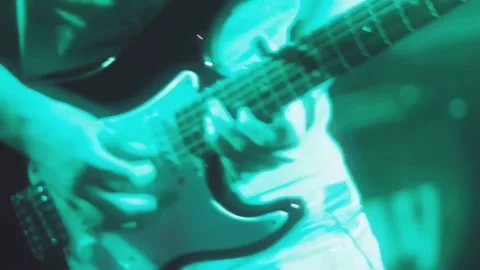 Soft focus guitar group shot. fingers pressing chords Stock Footage 300890675