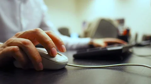  Soft focus to hand of the man clicking mouse button. Right hand from Video stock 67224836