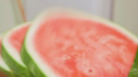 Soft Focus on a Man Cutting a Watermelon into Rings Stock Footage 79051446