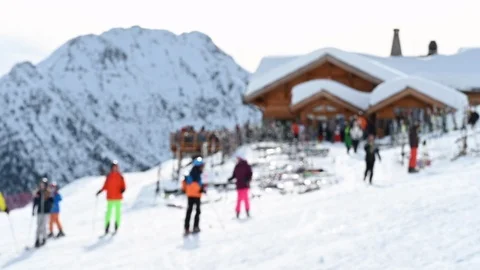 Soft focus mountain chalet on a ski slope resort Stock Footage 126666400