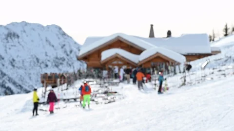 Soft focus mountain chalet on a ski slope resort Stock Footage 126667901