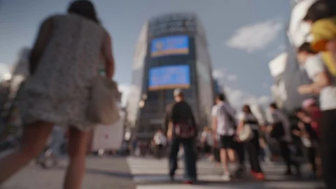 Soft Focus - People walking at the scramble intersection (Summer in shibuya) Stock Footage 94609413