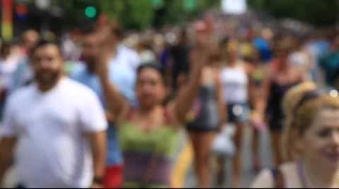 Soft focus, people walking, summer day, woman waving to camera Stock Footage 53008232