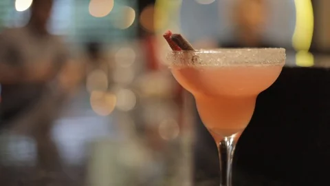 Soft Focus of Professional Pink Cocktail with Sugar Candy Stock Footage 128986981
