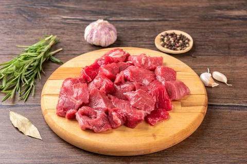 Soft focus on raw chopped beef or lamb meat - goulash. Stock Photos