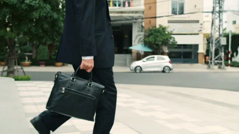 Soft focus rear view of hurry caucasian middle aged business man in luxury Stock Footage 171089389