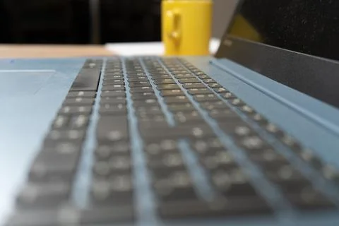 Soft focus of a Spanish version laptop keyboard. Technology concept, homeoffi Stock Photos