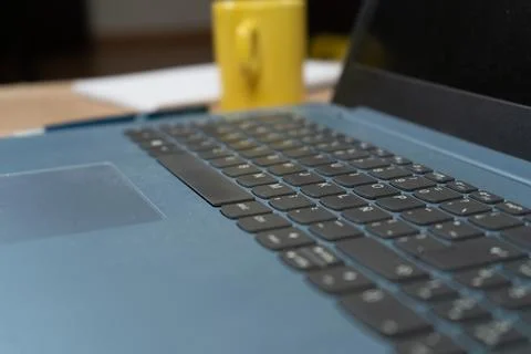Soft focus of a Spanish version laptop keyboard. Technology concept, homeoffi Stock Photos