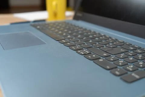Soft focus of a Spanish version laptop keyboard. Technology concept, homeoffi Stock Photos